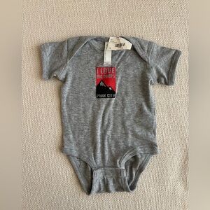 BRAND NEW BABY ONESIE